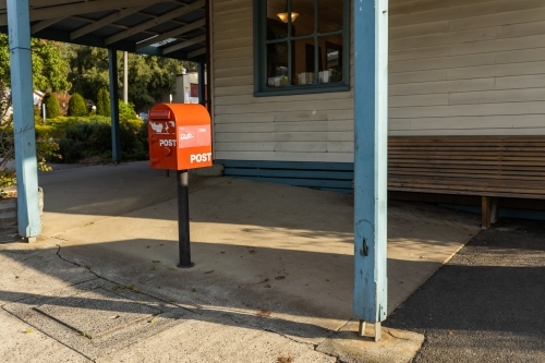 A red australia post letter box stripped of all branding and logos. - Australian Stock Image