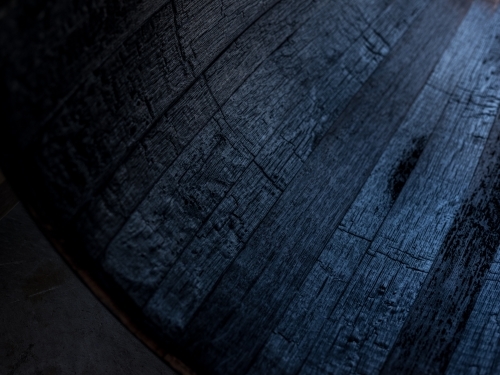 A whisky barrel being charred for storage - Australian Stock Image