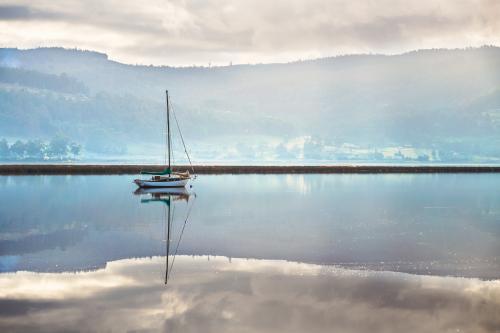 A yacht on a river - Australian Stock Image