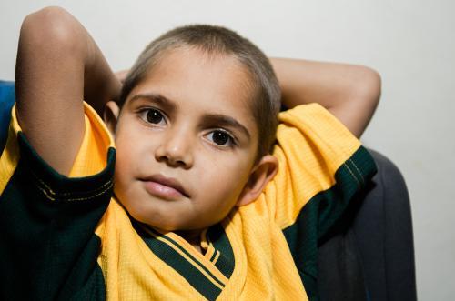 Aboriginal Boy with Arms Behind his Head