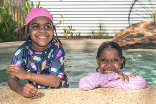 Aboriginal girls in the pool - Australian Stock Image