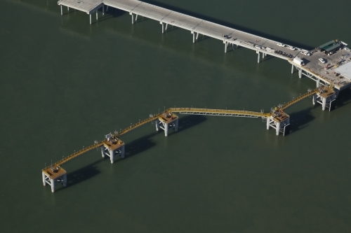 Aerial image of a large industrial bridge in water - Australian Stock Image