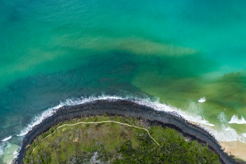 Aerial image of rocky coastline and beach front walking track - Australian Stock Image