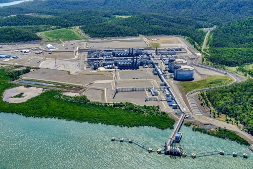 Aerial shot of liquified natural gas plants on Curtis Island, Queensland - Australian Stock Image