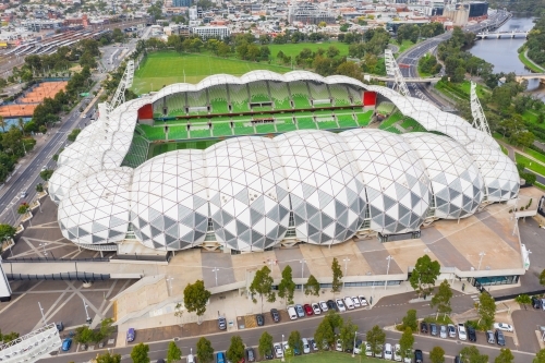 Aerial view looking down on a sports stadium with a modern architectural design - Australian Stock Image