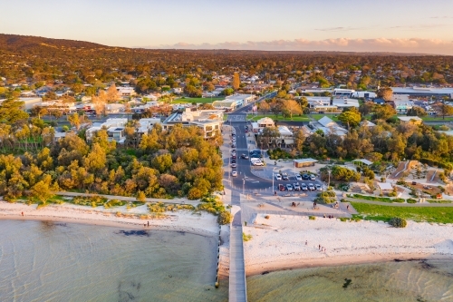 Aerial view of a coastal reserve a the base  of a wooden jetty - Australian Stock Image