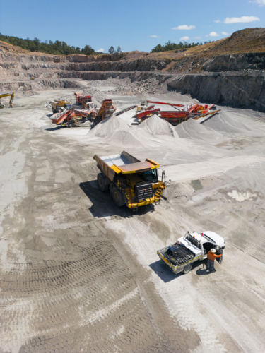 Aerial view of a dump truck in a quarry. - Australian Stock Image