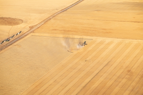 aerial view of crops being harvested - Australian Stock Image