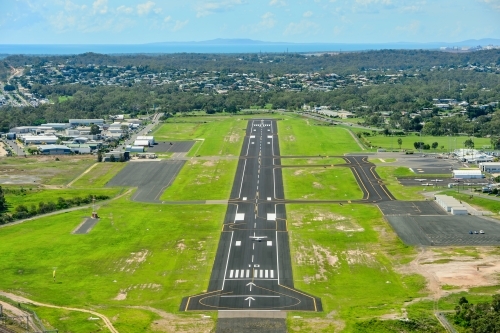 Aerial view of Gladstone Airport runway - Australian Stock Image