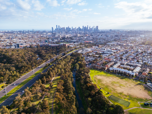 Aerial view of Melbourne skyline and Eastern Fwy and Yarra River on a cool winter's day from Clifton - Australian Stock Image