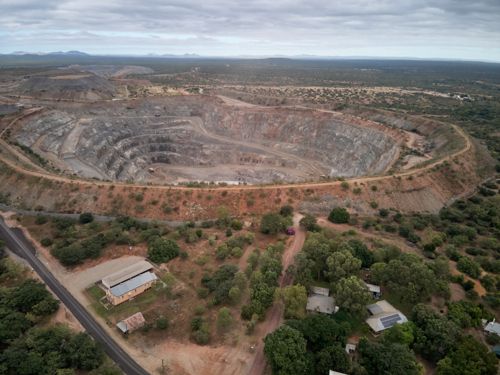 Aerial view of open-cut goldmine. - Australian Stock Image