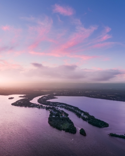 Aerial view of sunset over Dora Creek and Eraring on Lake Macquarie on the NSW Central Coast - Australian Stock Image