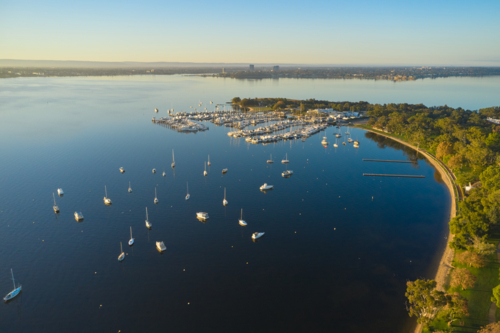 Aerial view of Yacht Club and Swan River in Perth with yachts and boats - Australian Stock Image