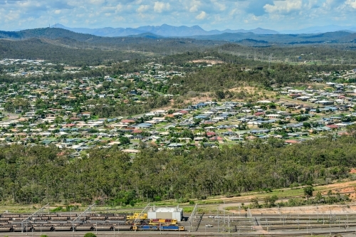 Aerial view towards Clinton suburb with coal trains in the foreground - Australian Stock Image