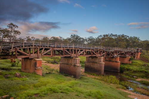 An old railway bridge over a creek - Australian Stock Image