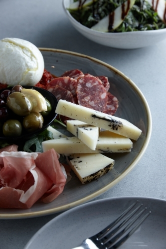 Antipasto platter on plate - Australian Stock Image