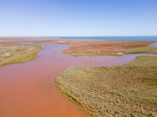 Ashburton River, Onslow, WA,  flowing into the Indian Ocean - Australian Stock Image