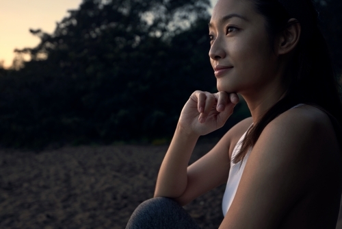 Asian woman in profile - Australian Stock Image