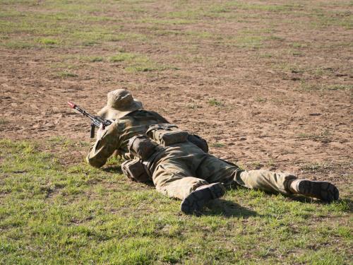 Australian Army Reserve Exercise - Soldier Lying with Gun - Australian Stock Image