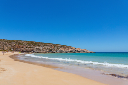 Australian beach in the bright summer sunshine - Australian Stock Image