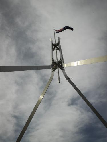 Australian Flag and mast at Parliament House from below - Australian Stock Image