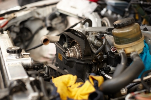 Automotive work on engine of vehicle - Australian Stock Image