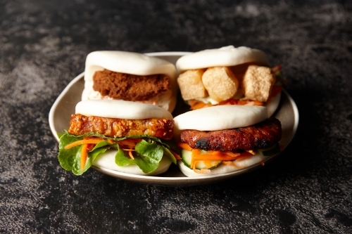 Bao buns on plate - Australian Stock Image