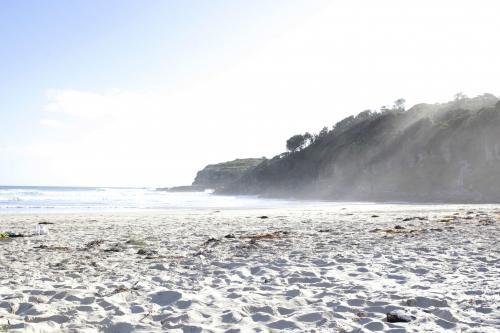 Beach scape in afternoon light - Australian Stock Image