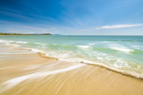 Beach waves on a sunny day - Australian Stock Image