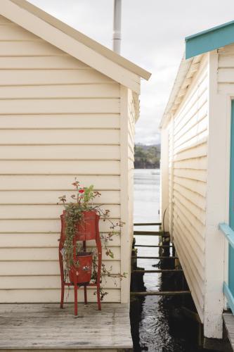 Boat house walls at Cornelian Bay - Australian Stock Image