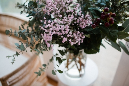 bouquet of flowers sitting on table - Australian Stock Image