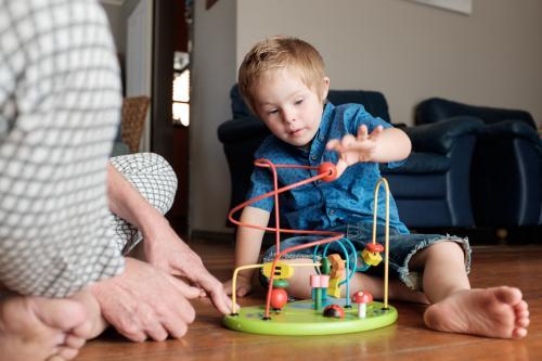 Boy playing with an Educational Toy - Australian Stock Image