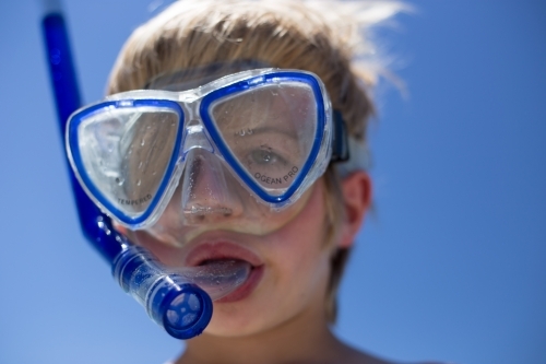 Boy with snorkle and goggles - Australian Stock Image