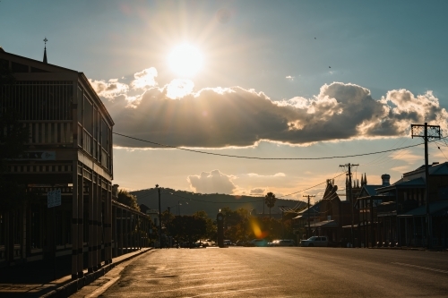Bright afternoon sunshine shining down on small country town - Australian Stock Image