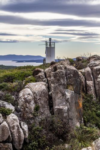 Bruny Island Rocks and Lighthouse - Australian Stock Image