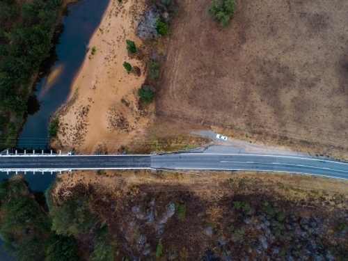Bulga bridge over stagnant creek on overcast day - Australian Stock Image