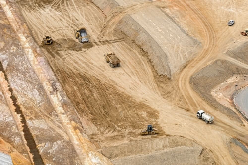 Bulldozers doing earth work on industrial construction site, Curtis Island, Queensland - Australian Stock Image