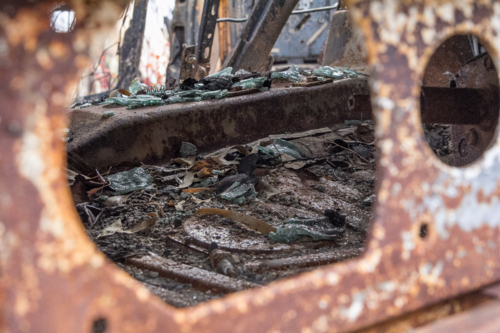 burnt out car after bushfire - Australian Stock Image