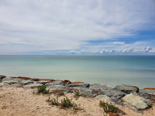 Calm beach with rocks - Australian Stock Image