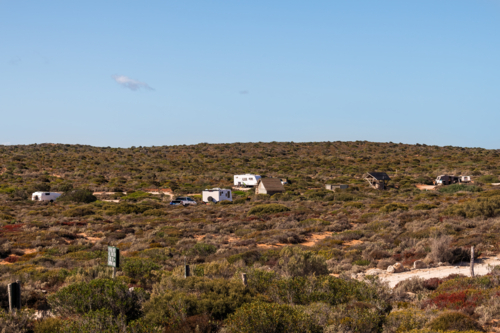 camping ground nestled in sand dunes, Cactus Beach, South Australia - Australian Stock Image