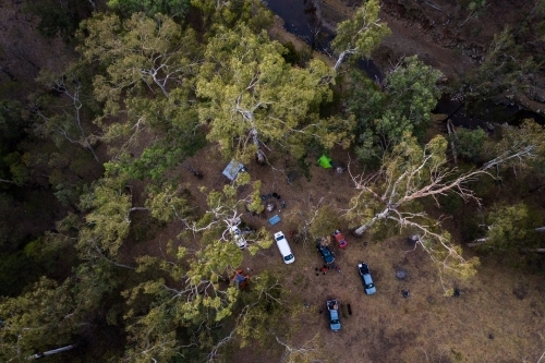 Car camping among trees from above - Australian Stock Image
