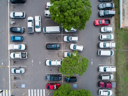 Car park beside shopping center in town - Australian Stock Image