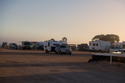 Caravans parked at roadhouse parking area, Eyre Highway, South Australia - Australian Stock Image
