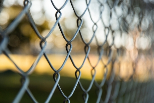 chain link fence at a sporting club - Australian Stock Image