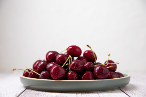 Cherries on a plate - Australian Stock Image