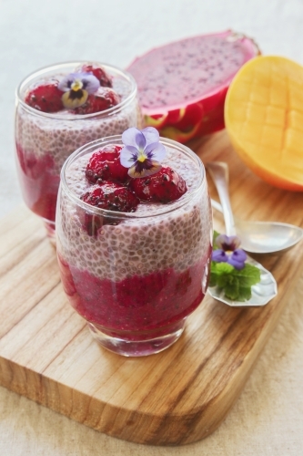 Chia seeds pudding with red dragon fruit and mango - Australian Stock Image