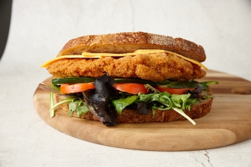 chicken schnitzel sandwich - Australian Stock Image