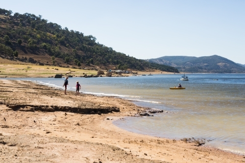 Children playing in the water at Wyangala dam - Australian Stock Image