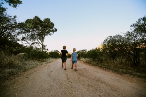 Children walking along bush track at Mount Hope in Central Victoria - Australian Stock Image