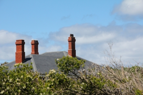 Chimneys on rooftop - Australian Stock Image